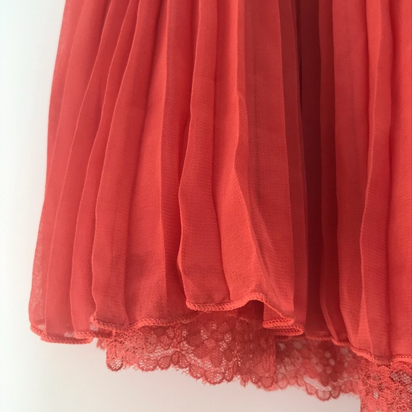 Pleated lace orange mini skirt - Picture 2 of 4